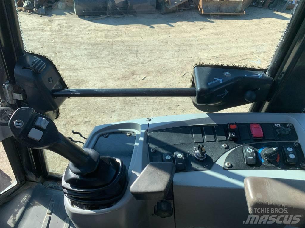 CAT 908H Фронтальные погрузчики