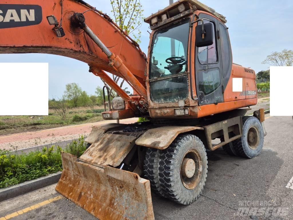 Doosan DX210WA Колёсные экскаваторы