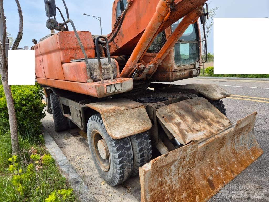 Doosan DX210WA Колёсные экскаваторы