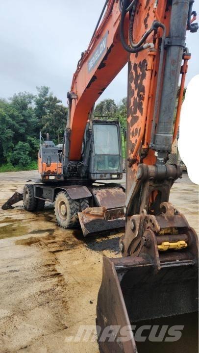 Doosan DX 210 W Колёсные экскаваторы