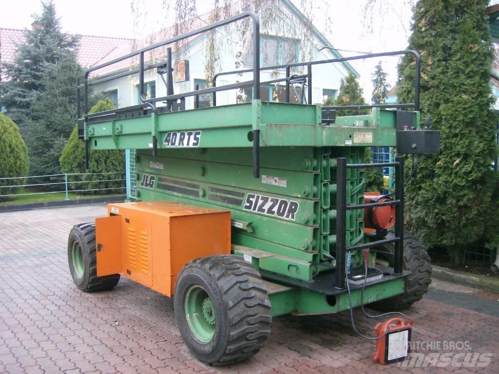 JLG 40RTS    V-1562 Вертикальные мачтовые подъемники