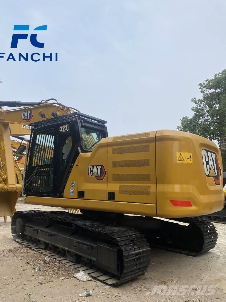 CAT 323 Малые экскаваторы 7т-12т