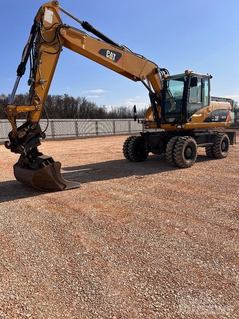 CAT 316D Колёсные экскаваторы