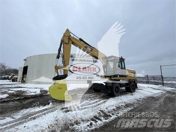 CAT M318D Колёсные экскаваторы
