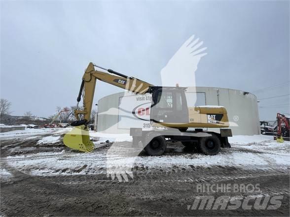 CAT M318D Колёсные экскаваторы
