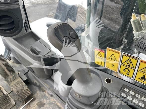 CAT M318D Колёсные экскаваторы