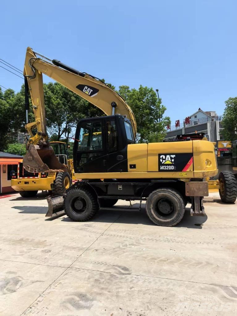 CAT M 320 Колёсные экскаваторы