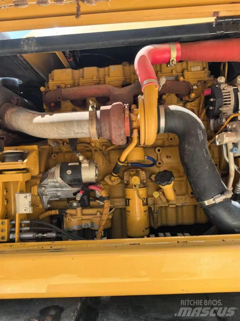 CAT M 320 Колёсные экскаваторы
