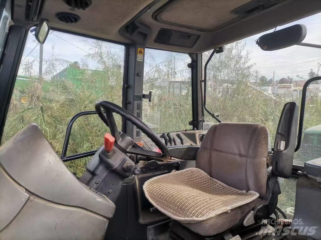 New Holland M160 Трактора