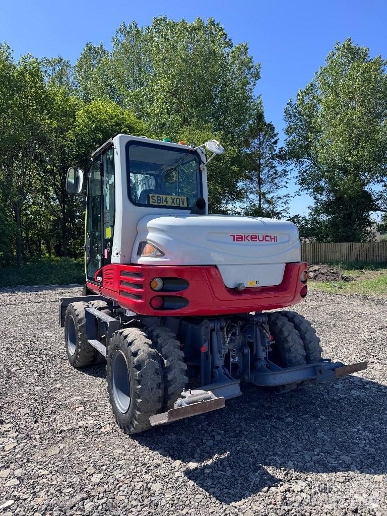 Takeuchi TB 295 W Колёсные экскаваторы
