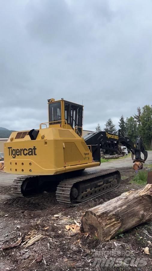 Tigercat 880D Лесопогрузчик