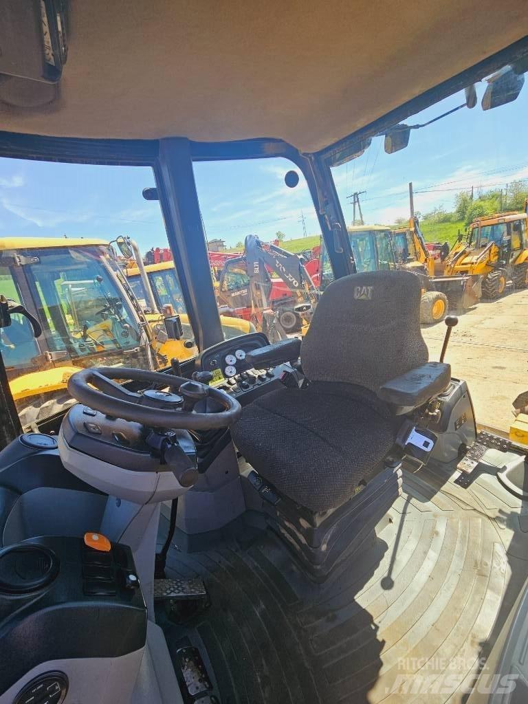 CAT 428 E Экскаваторы-погрузчики