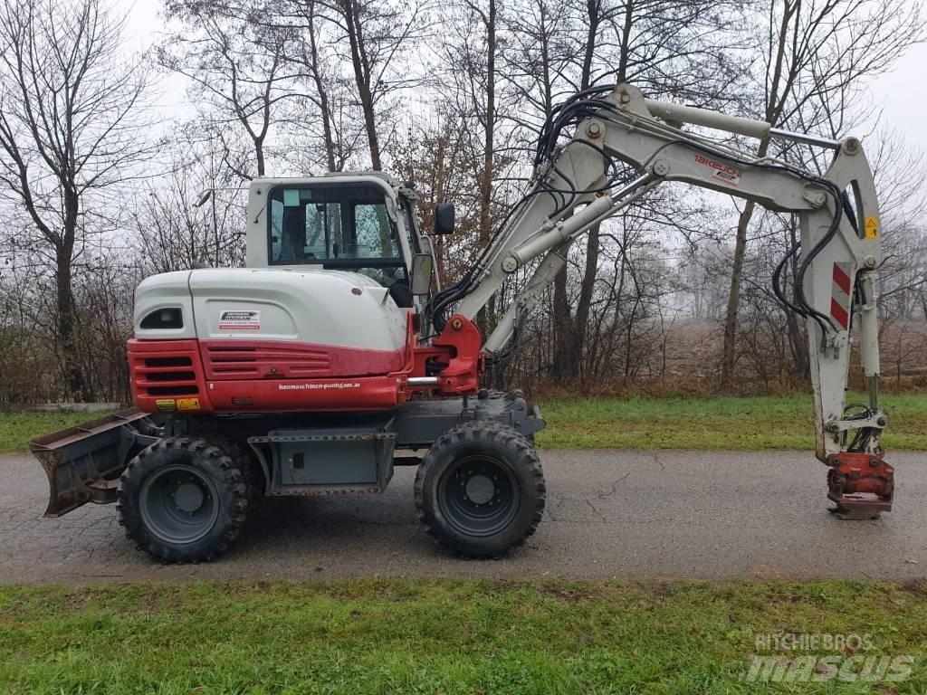 Takeuchi TB 295 W Колёсные экскаваторы