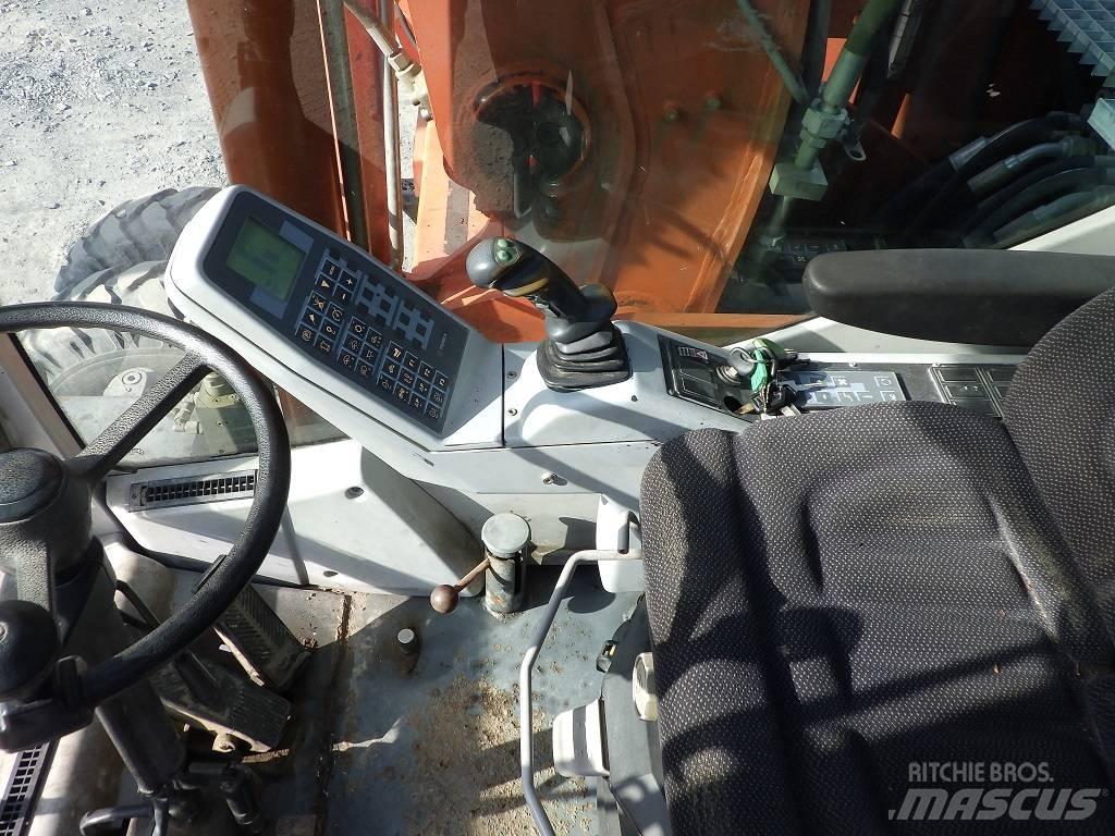 Atlas 1605 M Колёсные экскаваторы
