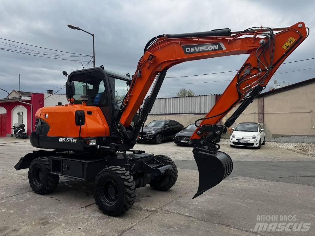 Develon DX 57 W-7 Колёсные экскаваторы