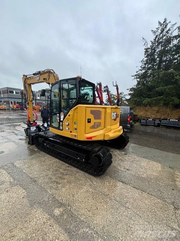 CAT 309 Малые экскаваторы 7т-12т