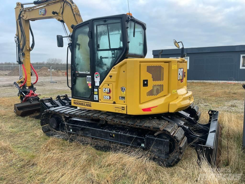 CAT 309 Малые экскаваторы 7т-12т