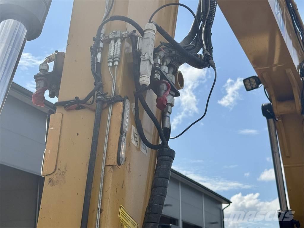 CAT 310 Малые экскаваторы 7т-12т