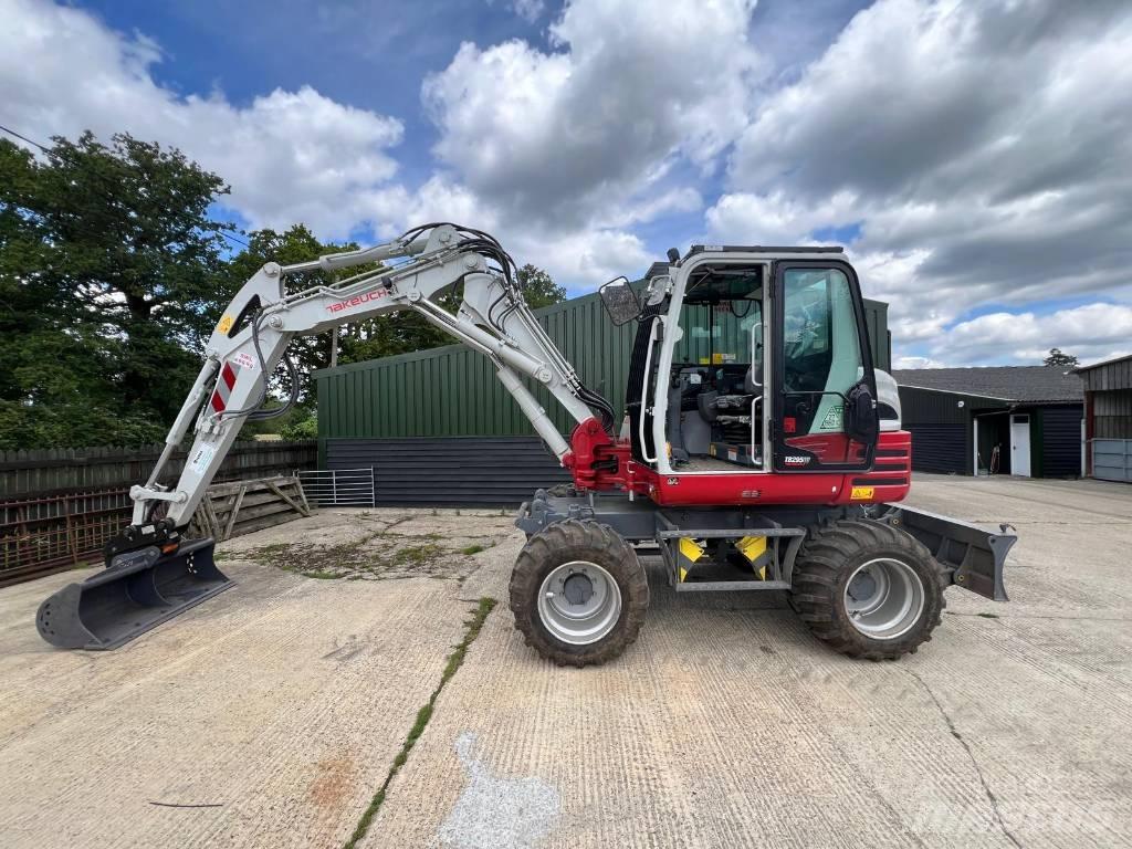 Takeuchi 295w Колёсные экскаваторы