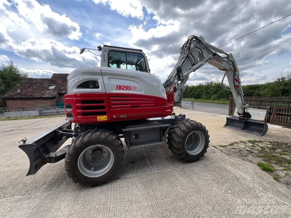 Takeuchi 295w Колёсные экскаваторы