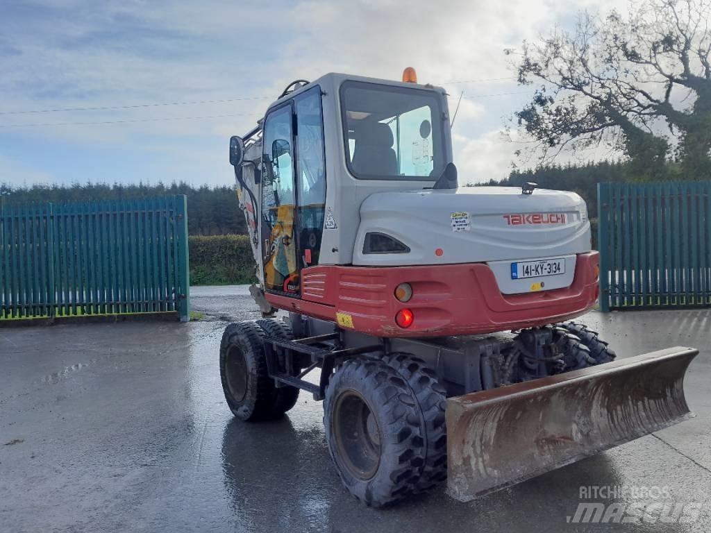 Takeuchi TB 295 W Колёсные экскаваторы