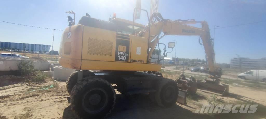 Komatsu PW 140-7 Колёсные экскаваторы