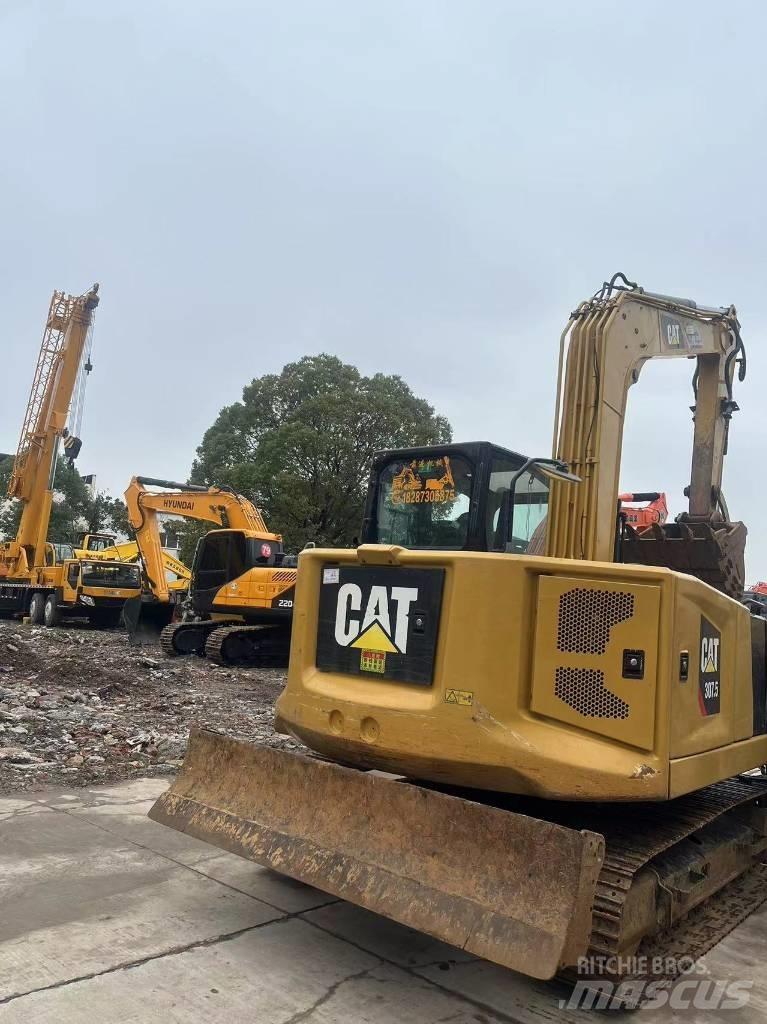 CAT 307.5 Малые экскаваторы 7т-12т