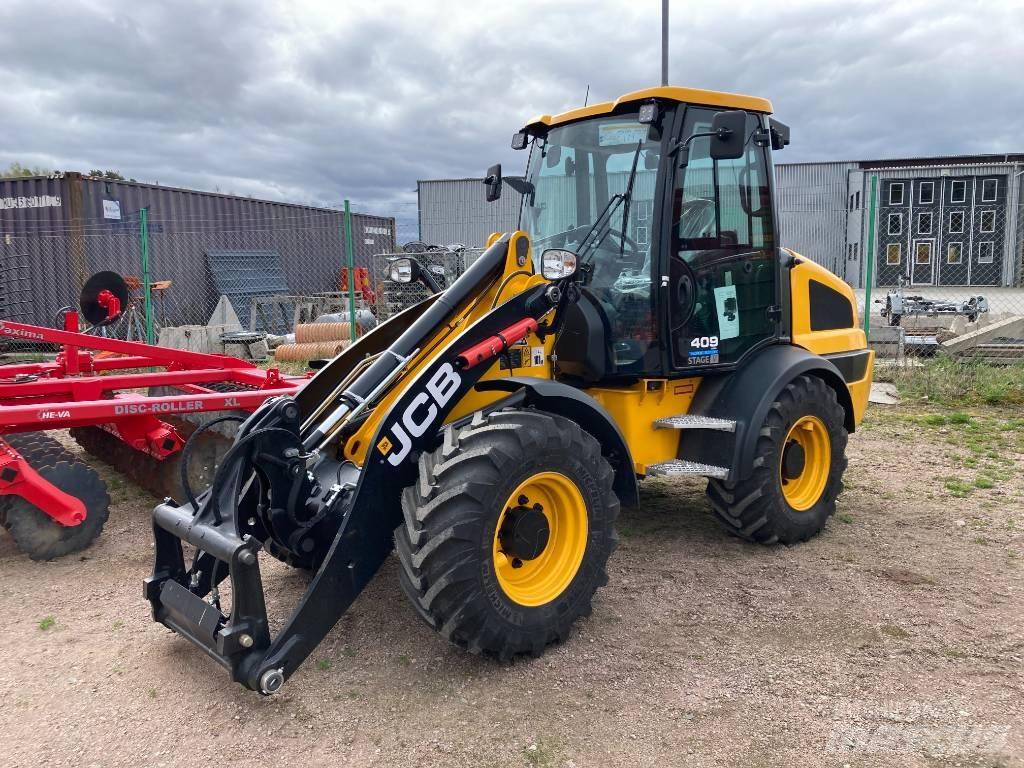 JCB 409 Фронтальные погрузчики