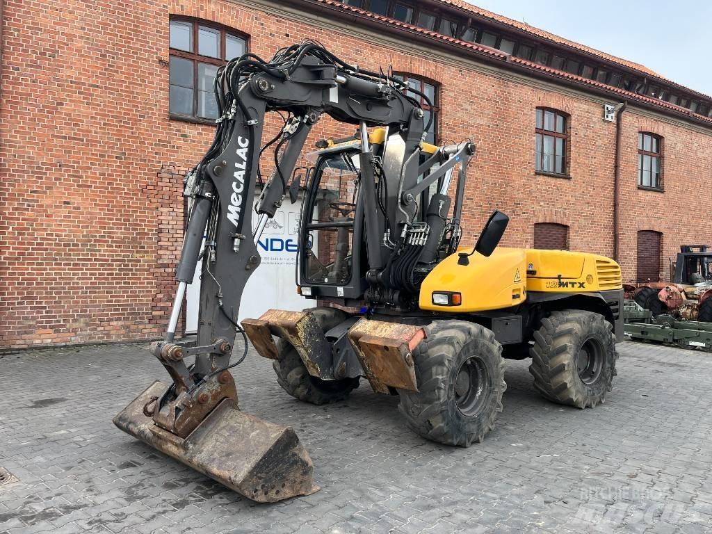 Mecalac 12 M TX Колёсные экскаваторы