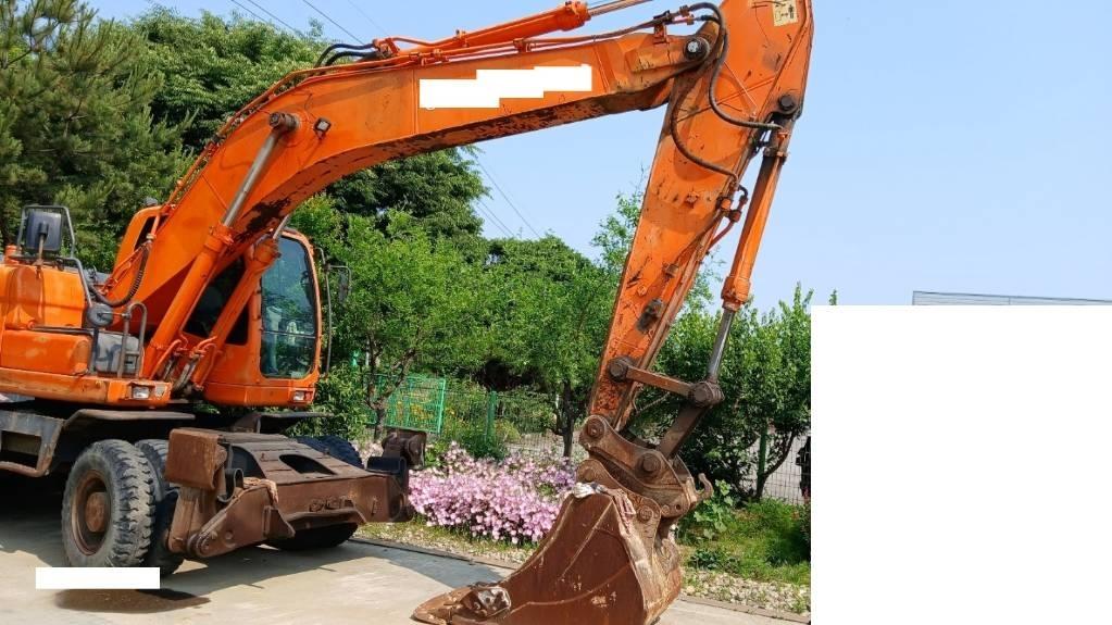 Doosan DX 210 W Колёсные экскаваторы