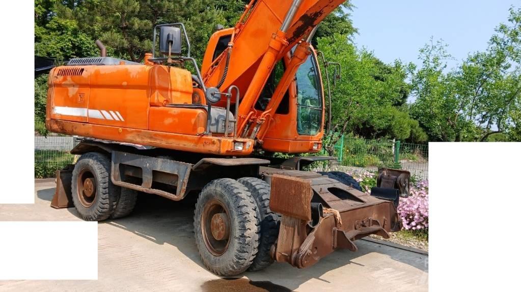 Doosan DX 210 W Колёсные экскаваторы