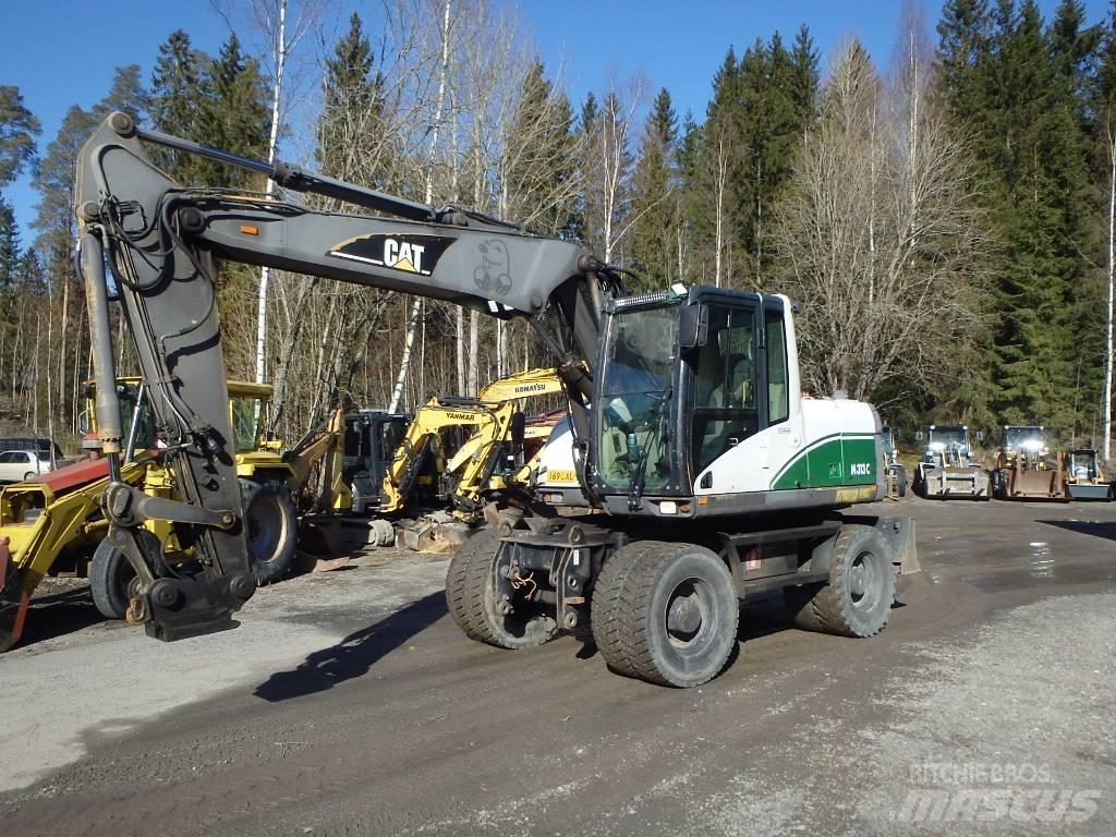 CAT M 313 C 4x4 Колёсные экскаваторы