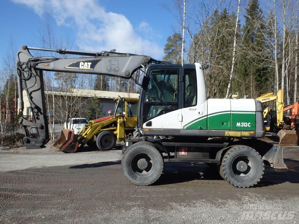 CAT M 313 C 4x4 Колёсные экскаваторы
