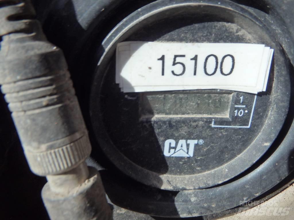 CAT M 313 C 4x4 Колёсные экскаваторы