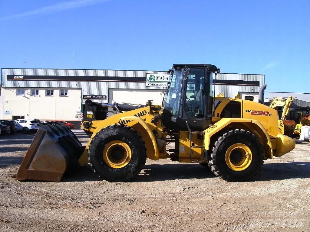 New Holland W 230 C Фронтальные погрузчики