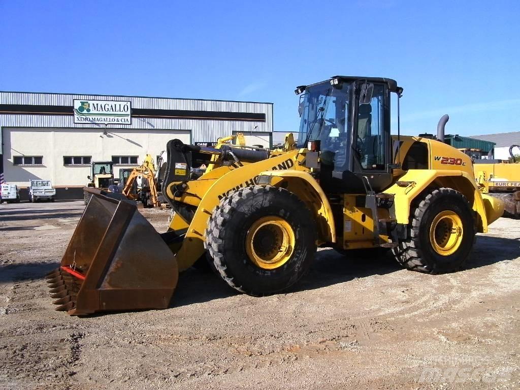 New Holland W 230 C Фронтальные погрузчики
