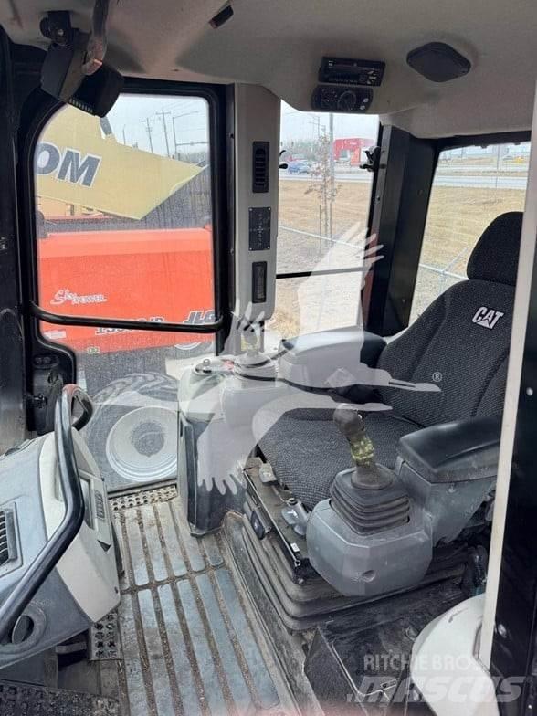 CAT 963K Гусеничные фронтальные погрузчики