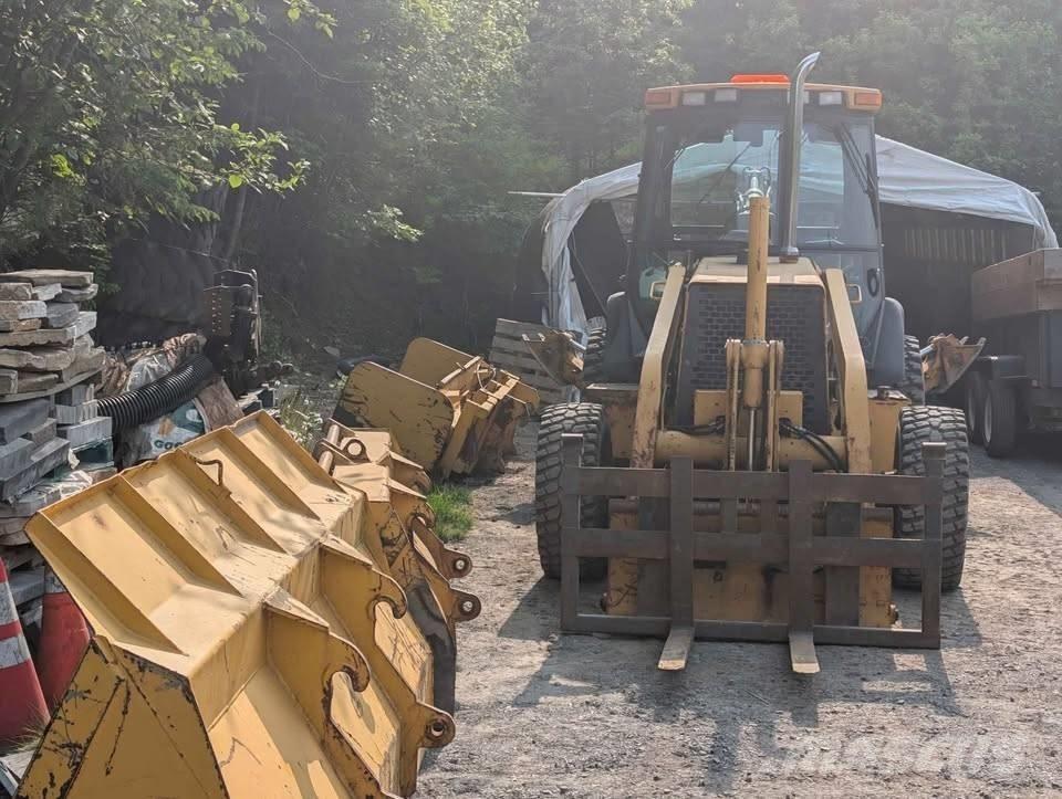 John Deere 310 SE Экскаваторы-погрузчики