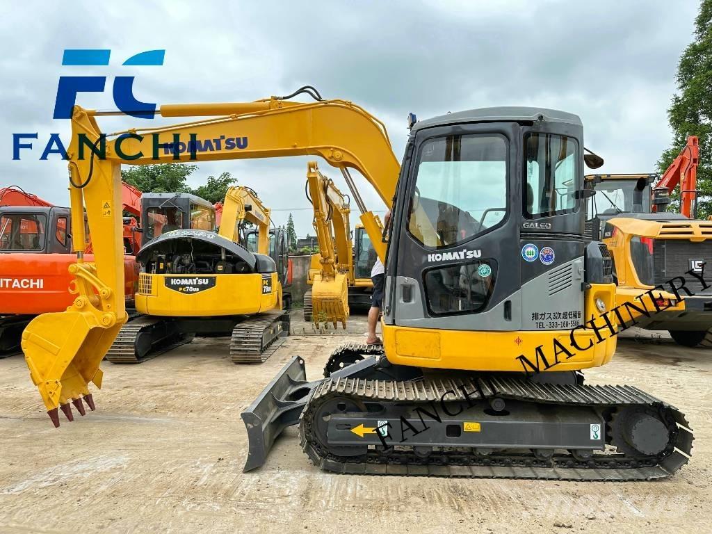 Komatsu PC78US Гусеничные экскаваторы
