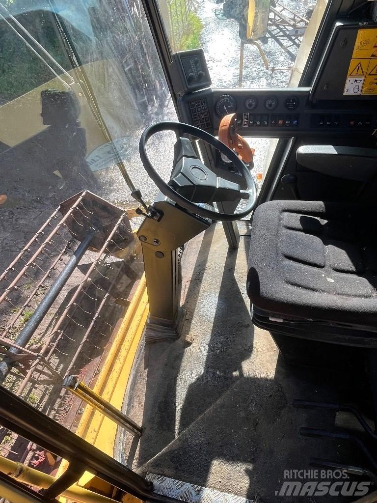 New Holland TC 56 H Зерноуборочные комбайны