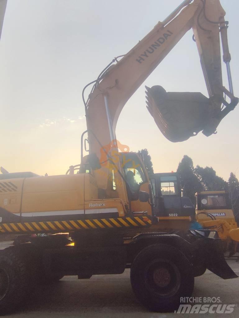 Hyundai 210W-9 Колёсные экскаваторы