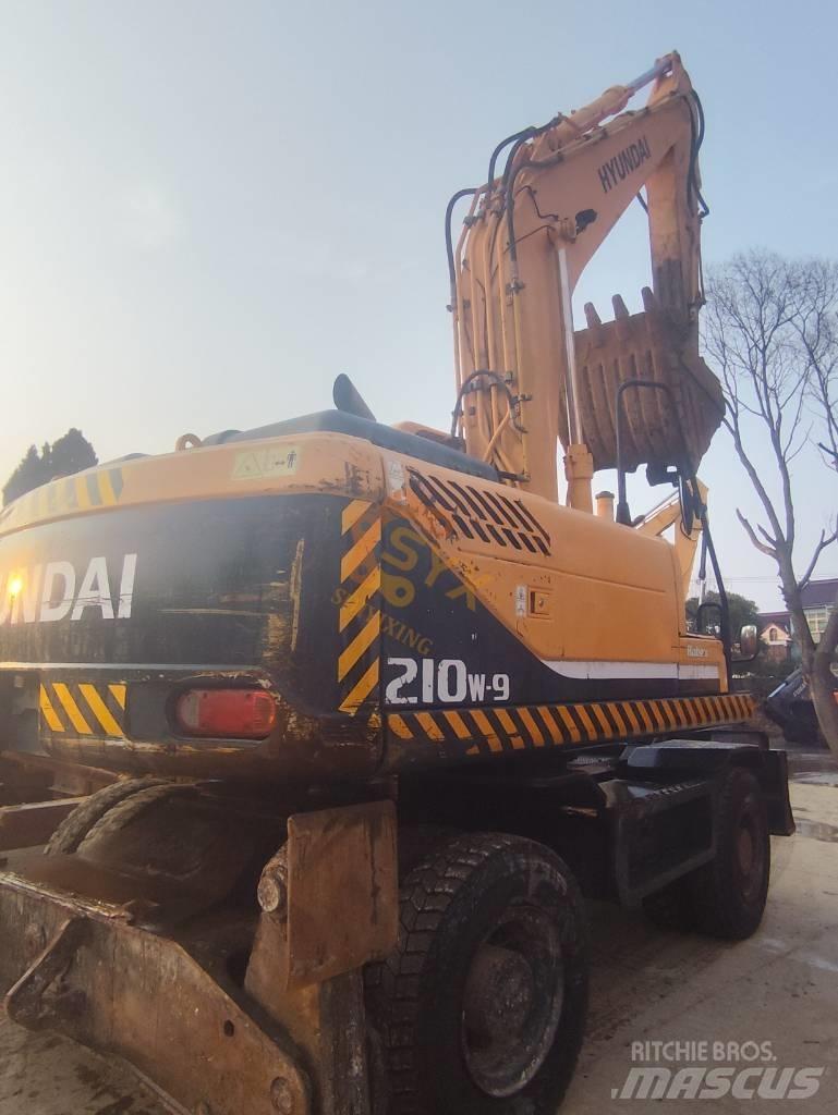 Hyundai 210W-9 Колёсные экскаваторы
