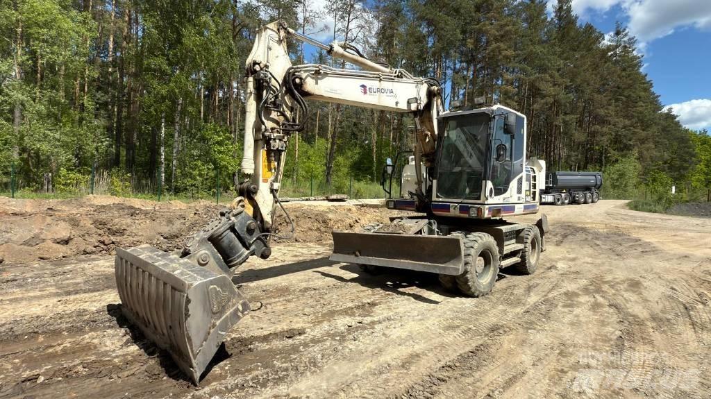 Komatsu PW 148-8 Колёсные экскаваторы