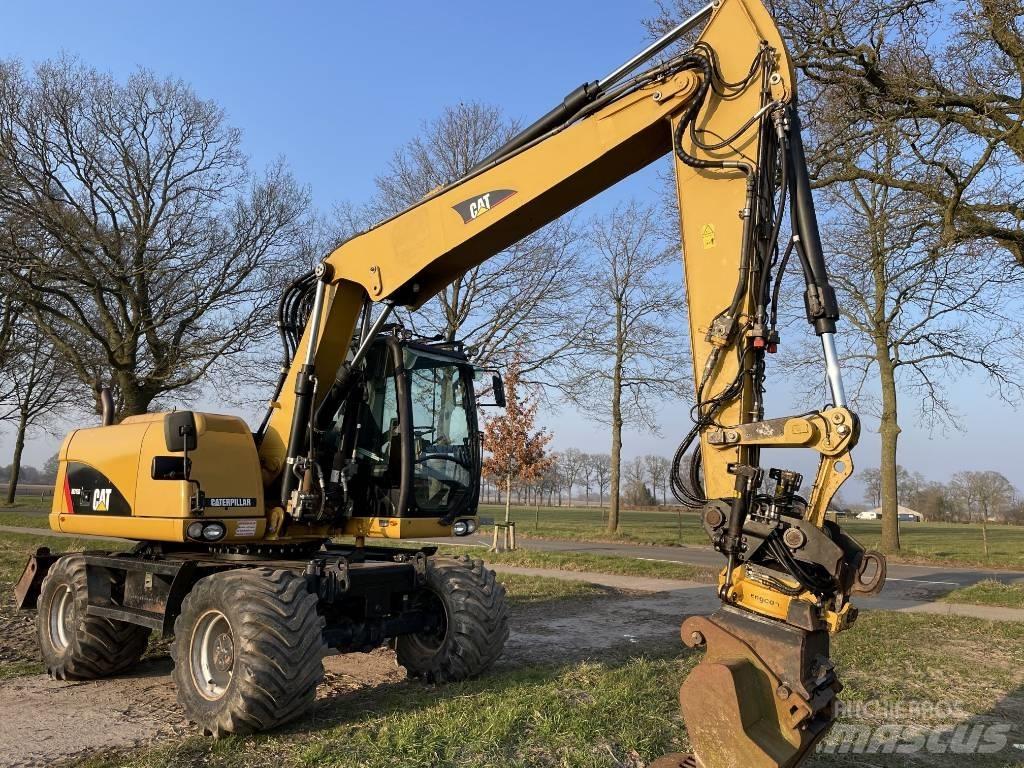 CAT M 313 D Колёсные экскаваторы