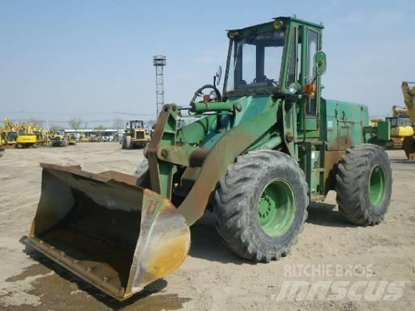 Komatsu 510 Фронтальные погрузчики