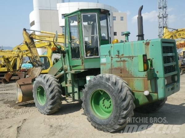 Komatsu 510 Фронтальные погрузчики