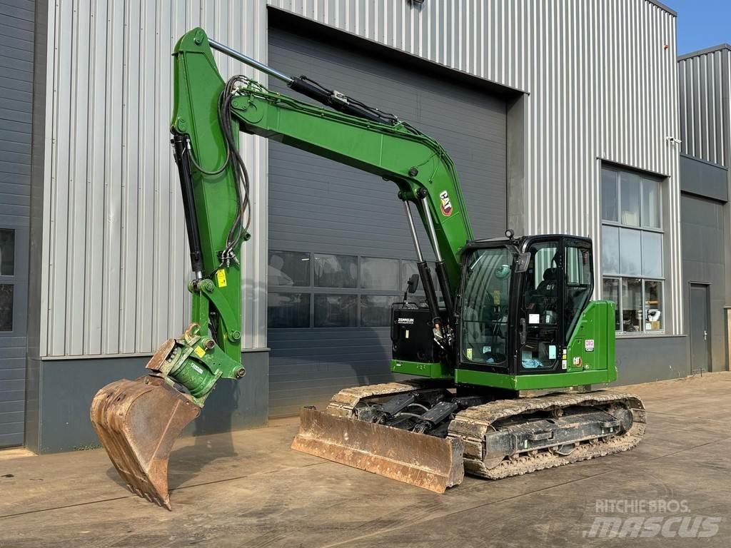 CAT 310 Малые экскаваторы 7т-12т