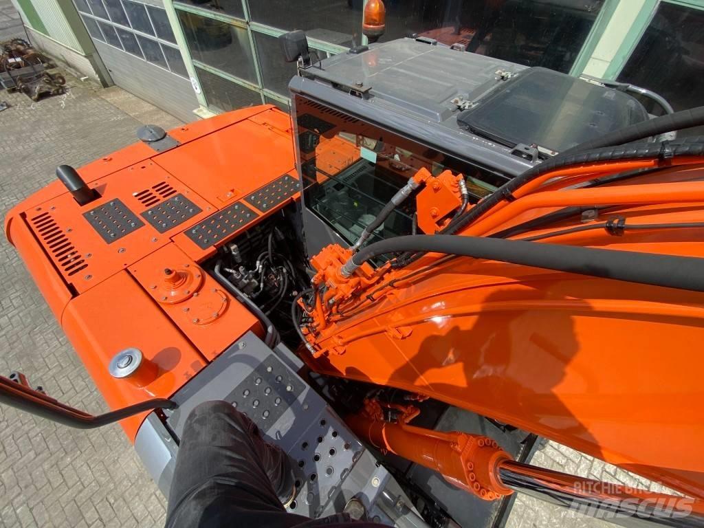 Hitachi ZX 140 W-3 Колёсные экскаваторы
