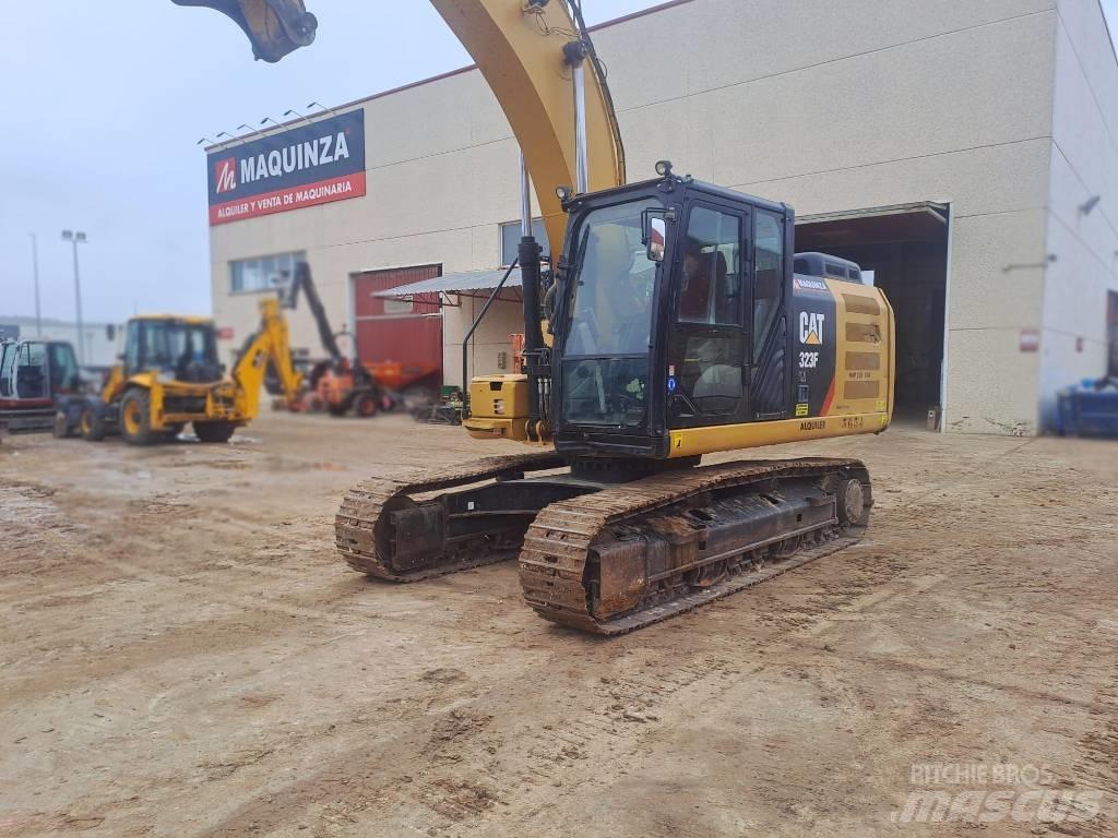 CAT 323FLN IHC Гусеничные экскаваторы