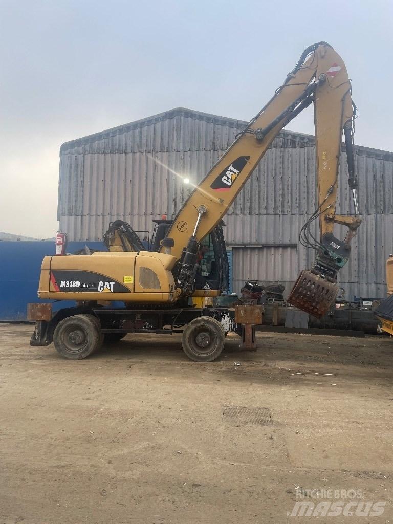 CAT 318 dmh Складская техника - Другие